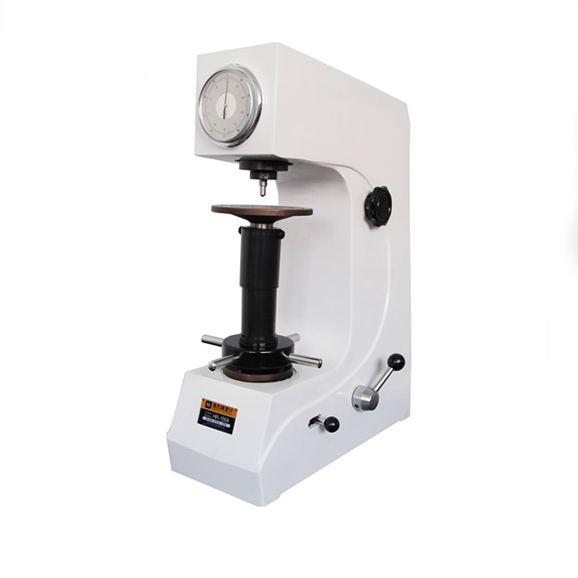 Rockwell hardness tester verifying heat-treated steel component